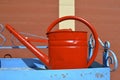 Brightly red painted retro water can Royalty Free Stock Photo