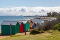 Brighton Beach colorful cabins with the Melbourne skyline, Melbourne, Victoria, Australia Royalty Free Stock Photo