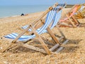 Brighton beach deck chairs out in sun for hire Royalty Free Stock Photo