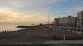 Brighton beach pebbles sunset buildings sea