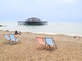 Brighton Beach and characteristic striped beach chairs Royalty Free Stock Photo