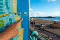 Brighton, England-1 October,2018: Asian young traveler read and point to the Brighton City town and Brighton Pier map on the board