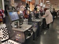 Brighton, England-18 October,2018: Sef-service counter machine in Mark and Spencer for customer with man and lady customer,