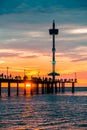 Brighton jetty with people silhouettes Royalty Free Stock Photo