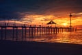 Brighton jetty with people silhouettes Royalty Free Stock Photo