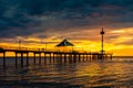 Brighton jetty with people silhouettes Royalty Free Stock Photo