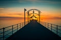 Brighton Jetty with people at sunset Royalty Free Stock Photo