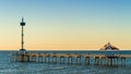 Brighton Jetty with people at sunset Royalty Free Stock Photo