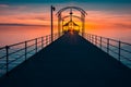 Brighton Jetty with people at sunset Royalty Free Stock Photo