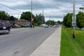 Downtown rural sreet of small town Canadian city of Brighton near Pesquile Lake Provincial Park in the summer cloudy and sunny day