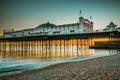 Brighton Pier beach with sunset golden hour at Sussex England, UK. Brighton Marine Palace and Pier popular place for visitor