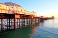 Brighton pier jutting out over sea at sunset Royalty Free Stock Photo