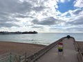 Brighton Pier and seafront under a cloudy sky Royalty Free Stock Photo
