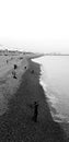 Brighton pier sunset beach pebbles  water sea Royalty Free Stock Photo