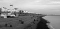 Brighton pier sunset beach pebbles  water sea Royalty Free Stock Photo