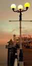 Brighton pier sunset beach pebbles  water sea Royalty Free Stock Photo