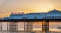 Brighton Pier during sunset in Brighton England Royalty Free Stock Photo