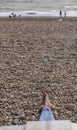 Brighton - seafront on a sunny day; people on the beach.