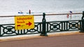 Brighton, Sussex, England beach with lifeguard sign