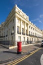 Brighton, Sussex, United Kingdom - March 9, 2020: Red letter box on the street at Brunswick Square in Hove