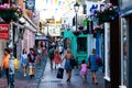 Brighton, UK - June 2018 People Walking Thru the Narrow Alley on Busy Day. Shops in The Lane in Brighton East Sussex