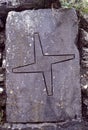 At Brigids cross carved into stone tablet St Brigids holy well  clondalkin  Dublin Ireland Royalty Free Stock Photo