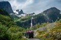 Briksdalsbreen glacier troll car excursion. Briksdal, Norway. Royalty Free Stock Photo