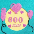 a brilliant banner for posting on a social network about 600 likes with balloons and hearts