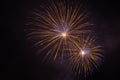 Brilliant blue and orange fireworks against the backdrop of the night sky Royalty Free Stock Photo