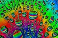 Brilliant burst of rainbow colors in bubbles in abstract background asset