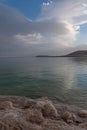 The brilliant colors of the Dead Sea and the clouds on a Winter`s day. Royalty Free Stock Photo