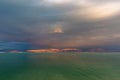 The brilliant colors of the Dead Sea and the clouds on a Winter`s day. Royalty Free Stock Photo