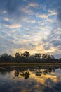 Brilliant colors of sunset over Buffalo Lake in northwoods