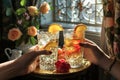 A brilliant display of summer-sweet citrus fruits, arranged on a crisp white table and gleaming glass drinkware Royalty Free Stock Photo