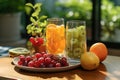 A brilliant display of summer-sweet citrus fruits, arranged on a crisp white table and gleaming glass drinkware