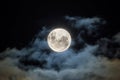 Full moon with wispy clouds