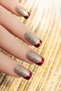 Brilliant Golden manicure. Royalty Free Stock Photo