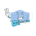 Brilliant musician of surgical mask cartoon design playing music with a guitar