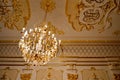 Brilliant old vintage antique beautiful classical palace beautiful luxury crystal glass expensive chandelier Royalty Free Stock Photo