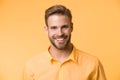 Brilliant smile. Man smiling face posing confidently yellow background. Man shop consultant looks cheerful confident and