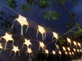 Brilliant Star paper lanterns in the night , Lanna Northern Thailand design style Royalty Free Stock Photo