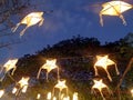 Brilliant Star paper lanterns in the night , Lanna Northern Thailand design style Royalty Free Stock Photo