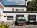 Brillux Logo Sign and a Delivery Truck Royalty Free Stock Photo