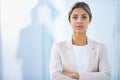 Brimming with confidence. Portrait of an attractive young businesswoman standing in an office.