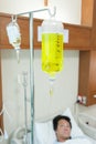 Brine for sick male patient lying in a hospita Royalty Free Stock Photo