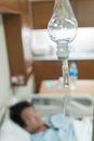 Brine for sick male patient lying in a hospita Royalty Free Stock Photo