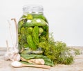 Brined pickles in a jar