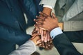 Bring it in, team. Closeup shot of a group of unidentifiable businesspeople joining their hands together in unity. Royalty Free Stock Photo