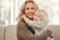 He brings so much joy into my life. a mature mother enjoying time with her son at home. Royalty Free Stock Photo