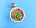 Brinjal or Eggplant Indian Vegetarian Curry on a Wooden Background Royalty Free Stock Photo